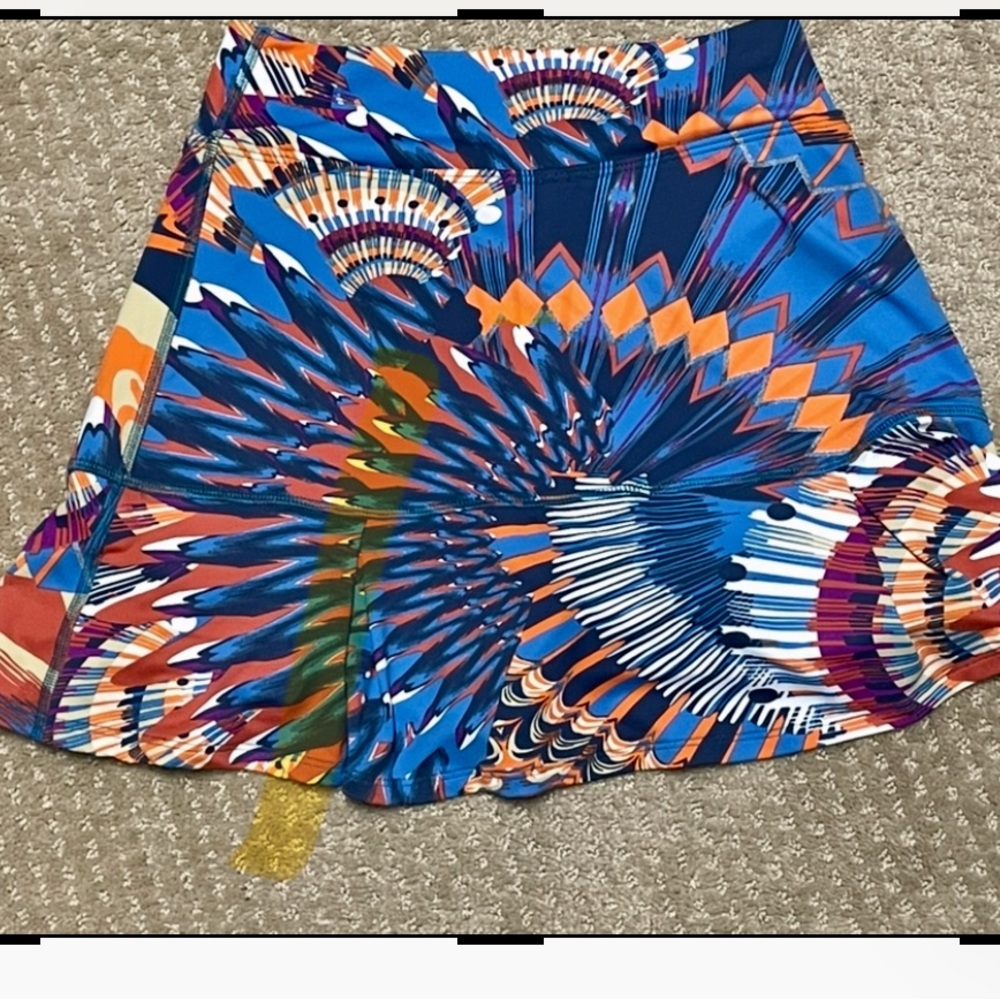 DonaJo Skort size Small or size 4. Tag says 1 but is compared to size 4 or small